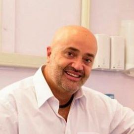 a man smiling for the camera