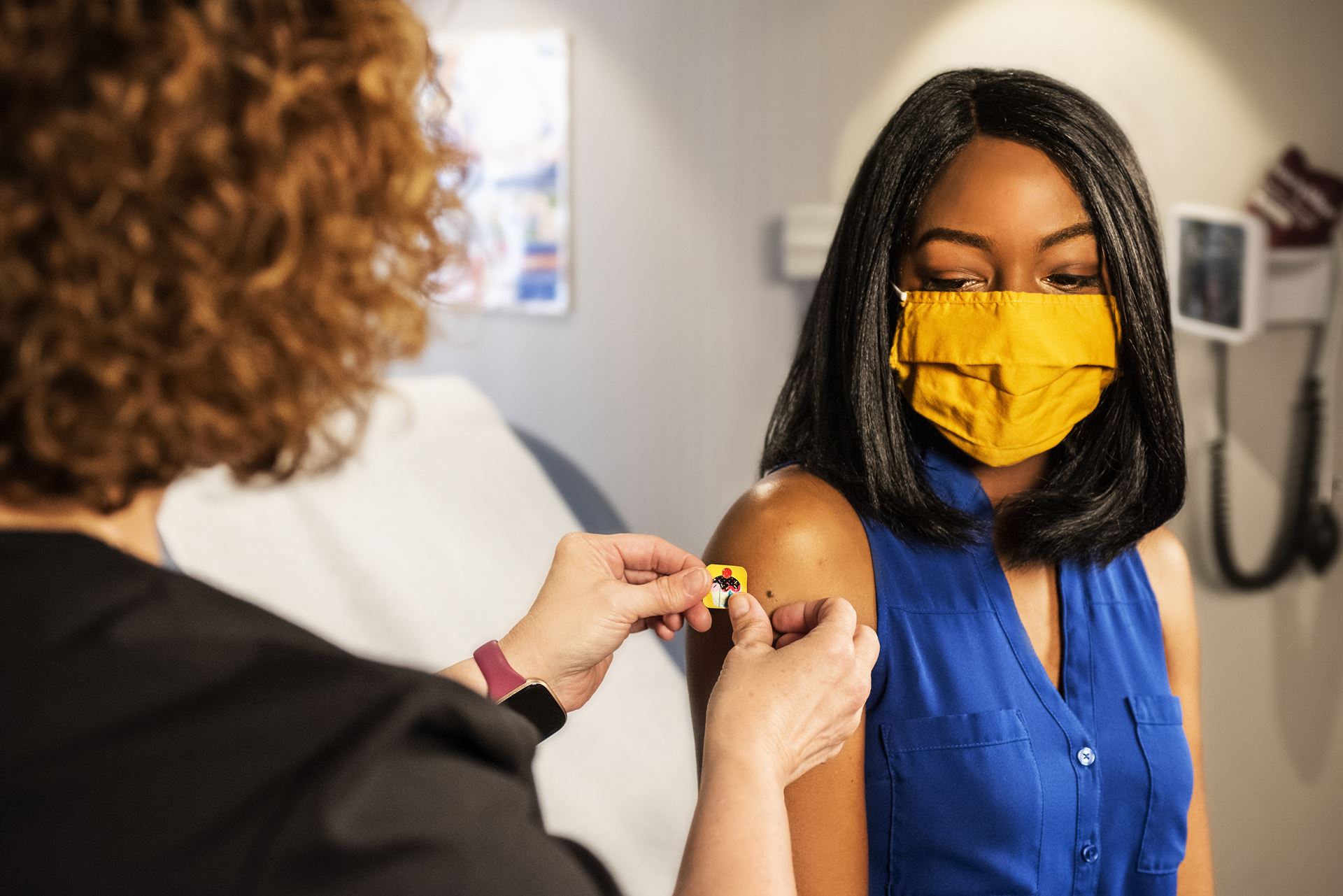 a woman receiving a vaccination